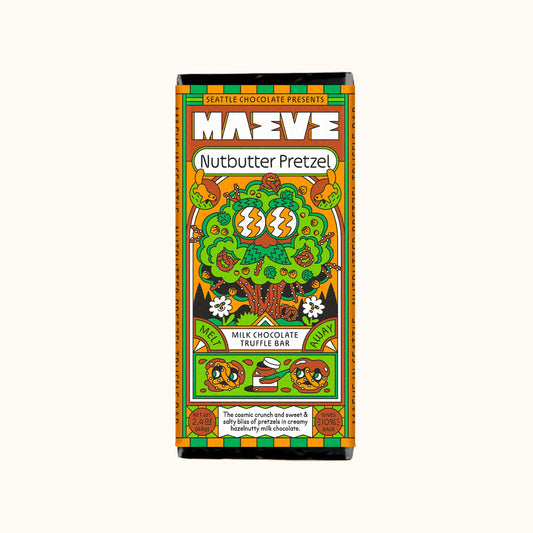 A packaged chocolate truffle bar on a plain white background. The wrapper is highly colorful with a whimsical illustrated design featuring a tree, squirrels, pretzels, and the brand name 'MAZE' in large white letters.
