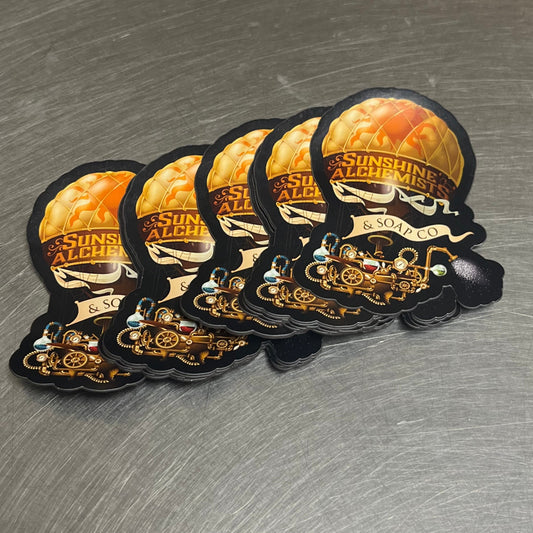 stack of die cut magnets showing a steampunk hot air balloon with bathtub laboratory