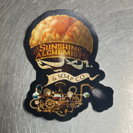 Die Cut magnet of a steampunk hot air balloon with bathtub alchemical laboratory